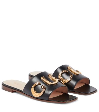 gucci cara logo leather flat slides|flat gucci sandals.